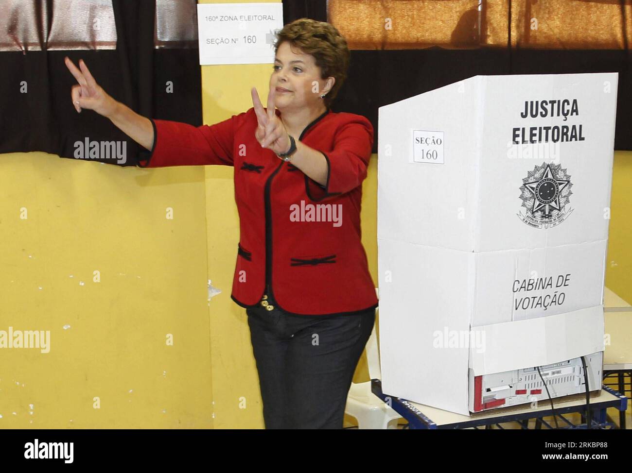 101031 -- PORTO ALEGRE, Oct. 31, 2010 Xinhua -- Brazilian presidential candidate for the ruling Workers Party Dilma Rousseff gestures as she votes at a polling station in the city of Porto Alegre, Rio Grande do Sul state, Brazil, Oct. 31, 2010. Brazilian polls opened at 8:00 a.m. local time 1000 GMT on Sunday for the runoff of the presidential election, in which 135.8 million voters would choose a new president and nine governors. Xinhua/Agencia EstadoBRASIL OUT zw BRAZIL-PRESIDENTIAL ELECTION-RUNOFF PUBLICATIONxNOTxINxCHN Stock Photo