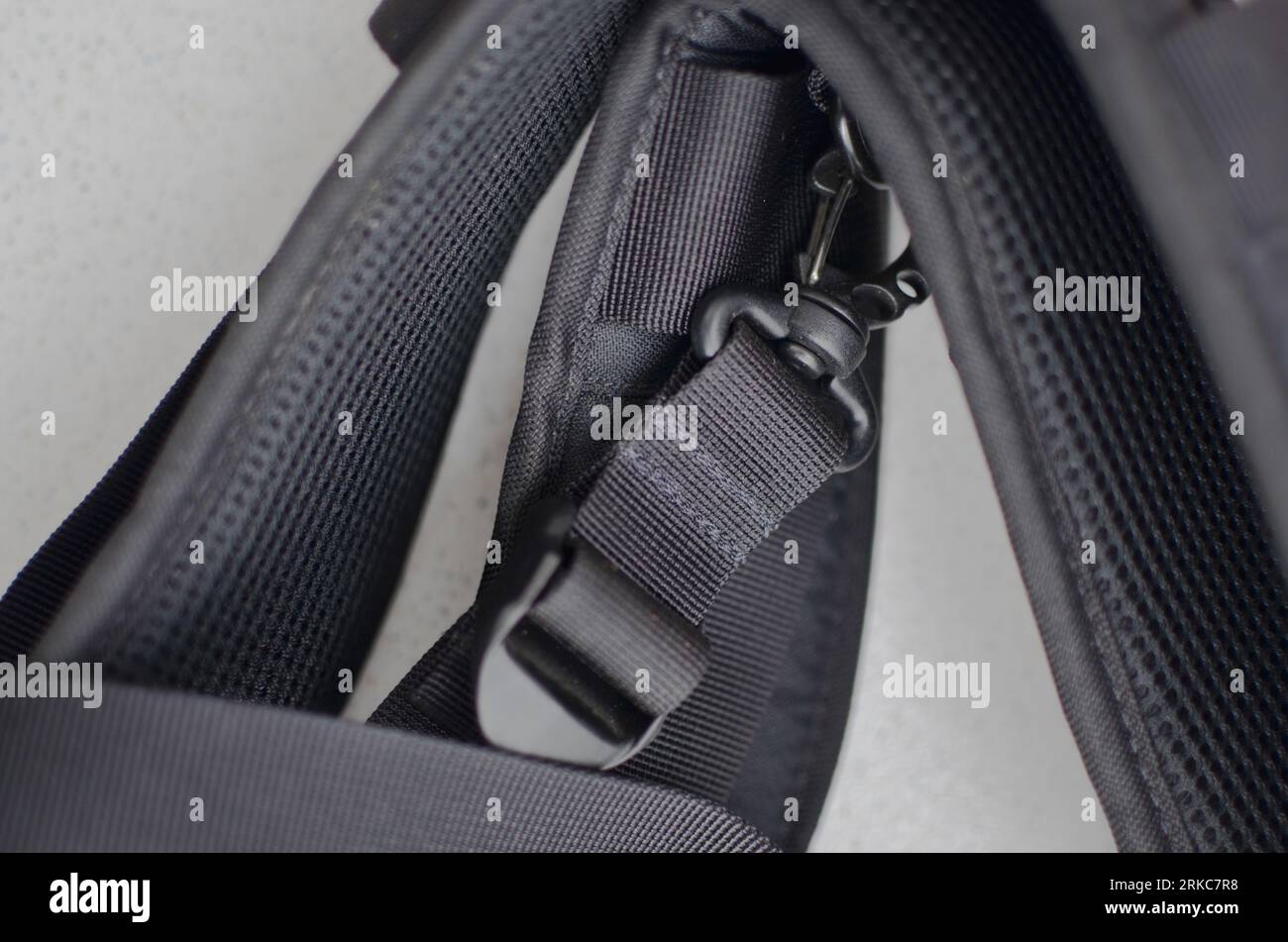 Black suspender or belt close-up, elegant and high-quality accessory to complete your style. Concept for backpacks or military accessories. Stock Photo