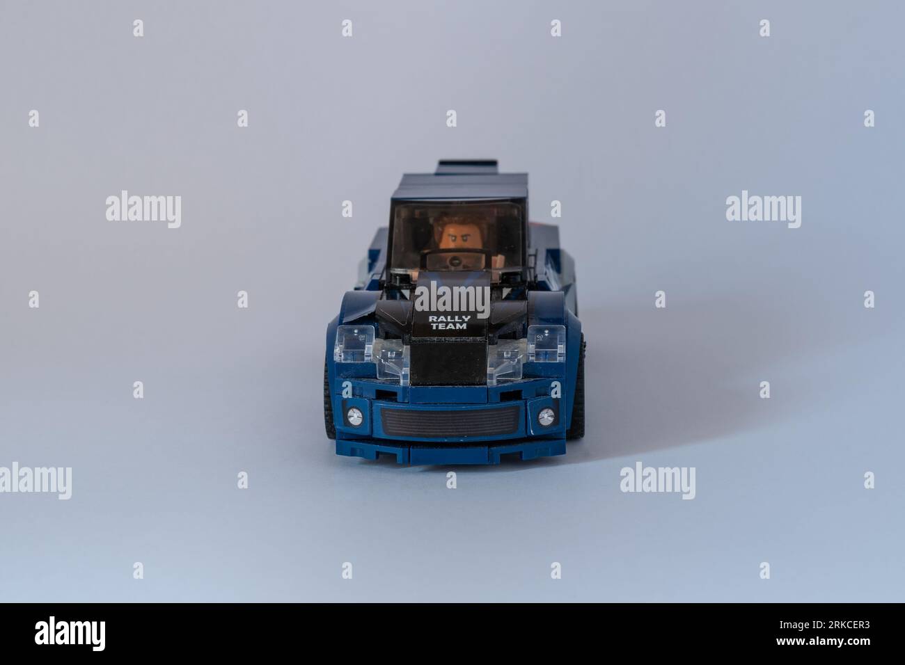Doha, Qatar August 24, 2023 Blue plastic building blocks car on a white background Stock