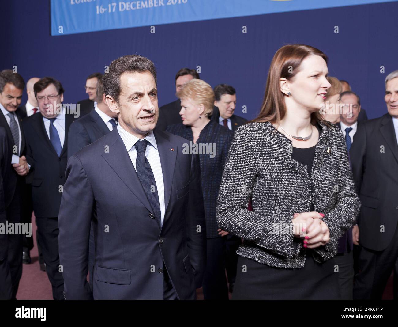 Bildnummer: 54755249  Datum: 16.12.2010  Copyright: imago/Xinhua (101216) -- BRUSSELS, Dec. 16, 2010 (Xinhua) -- French President Nicolas Sarkozy (L) and Finnish Prime Minister Mari Kiviniemi leave after a familly photo during the EU Summit at the EU headquarters in Brussels, capital of Belgium, on Dec. 16, 2010. EU leaders began their two-day summit on Thursday, looking to amend the Lisbon treaty to pave the way for the establishment of a permanent rescue mechanism to restore market confidence. (Xinhua/Thierry Monasse) (zw) BELGIUM-BRUSSELS-EU-SUMMIT PUBLICATIONxNOTxINxCHN Politik People EU G Stock Photo