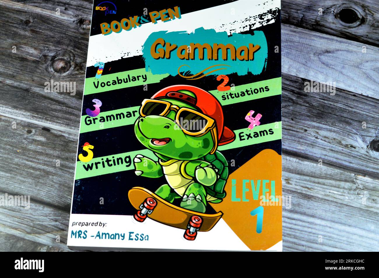 Cairo, Egypt, August 18 2023: Book and Pen grammar, Educational books