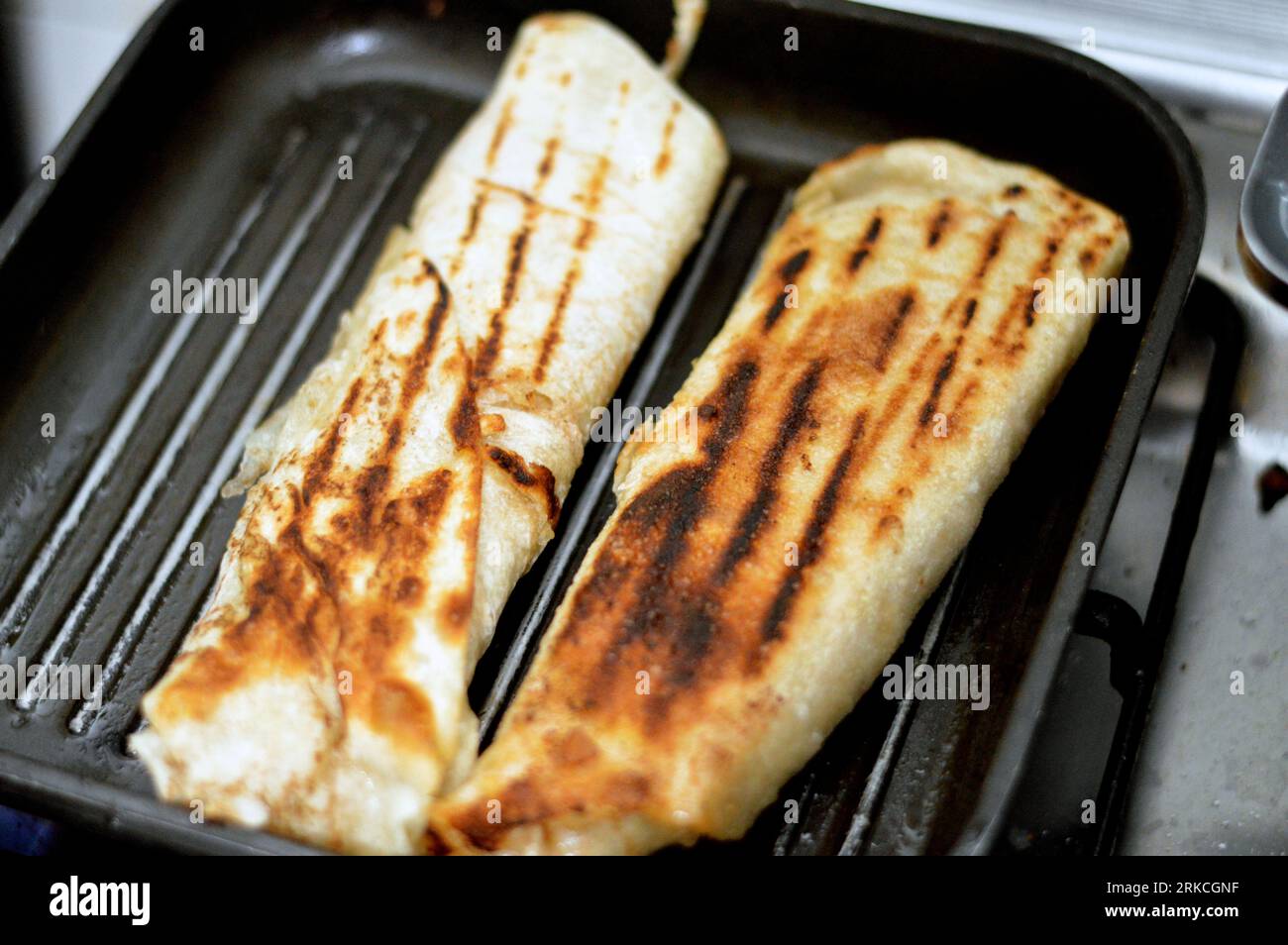 Syrian recipe cuisine background, chicken shawerma or shawarma tortilla