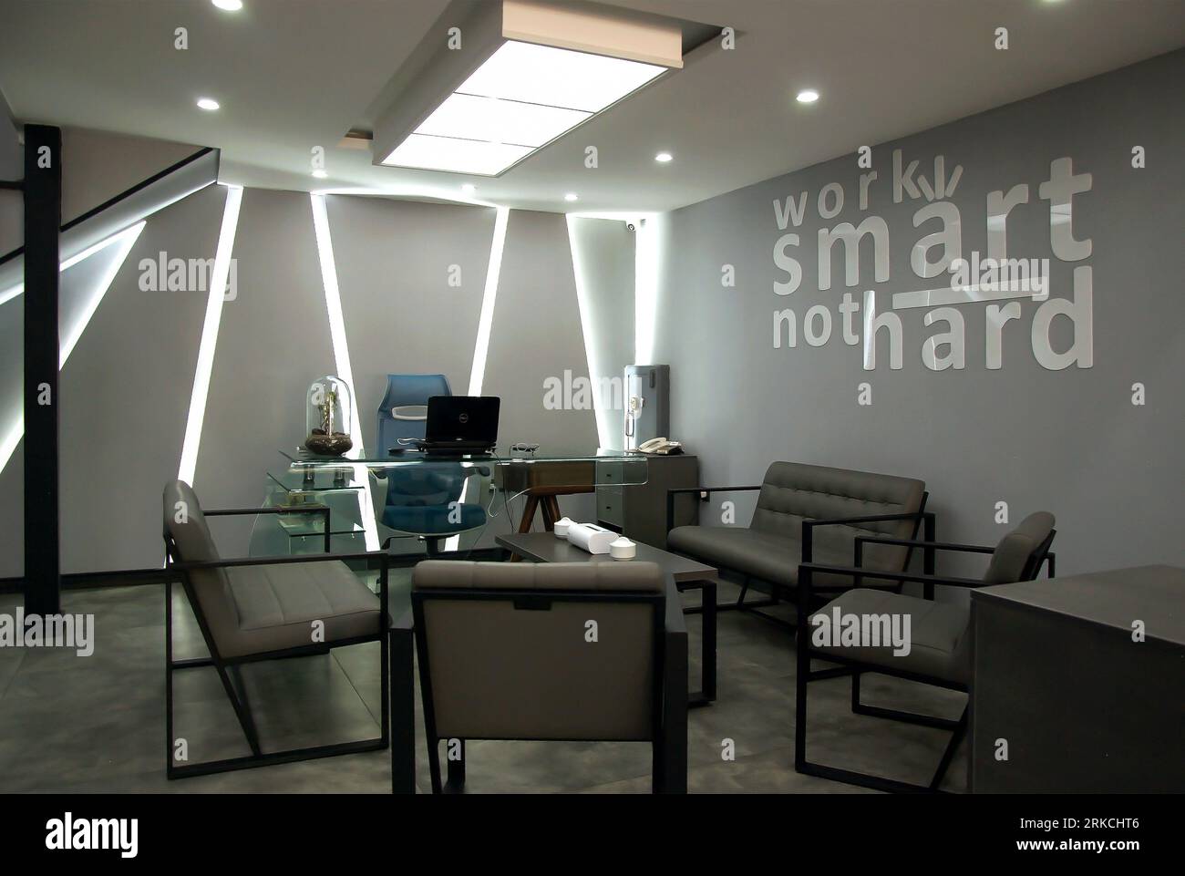 A professional conference room with modern office furniture and a