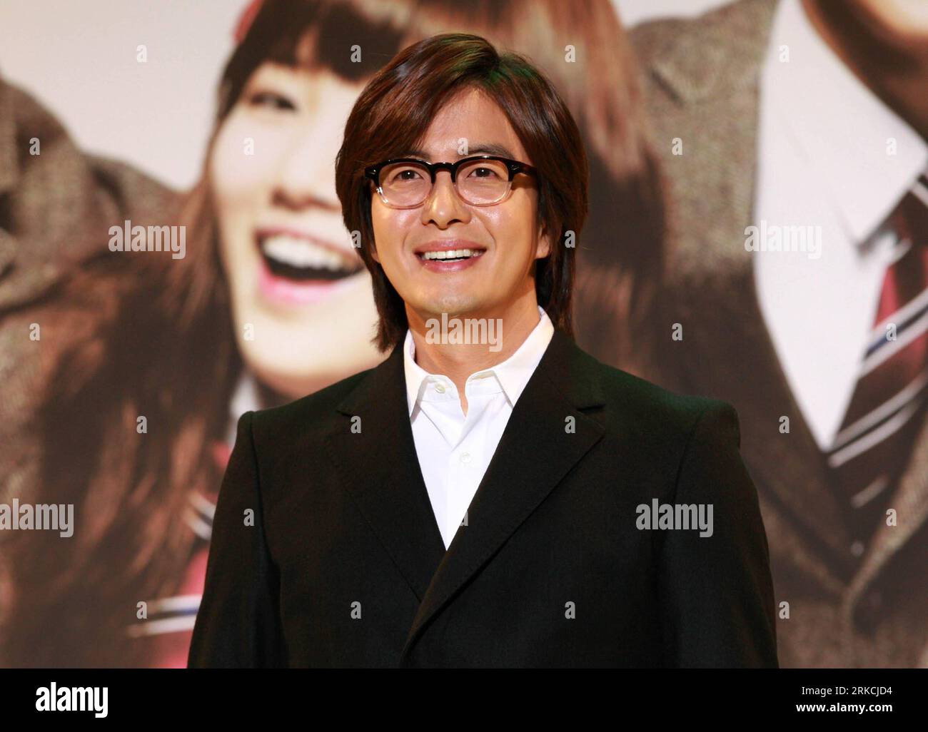 South Korean actor Bae Yong-joon smiles during a news conference