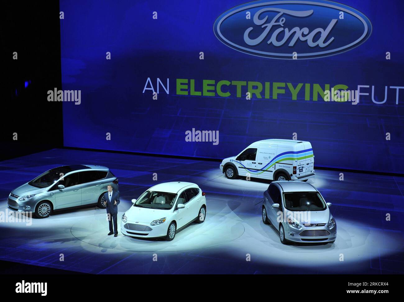 110110 -- DETROIT, Jan. 10, 2011 Xinhua -- Bill Ford, Executive Chairman of Ford Motors, stands with L-R the C-MAX electric car, the Focus electric car, the Transit Connect electric truck and the C-MAX hybrid at the North American International Auto Show NAIAS in Detroit, the United States, Jan. 10, 2011. The 2011 NAIAS kicked off on Monday at the Cobo center in Detroit, the U.S. auto city, with more than 40 global top-notch auto brands showcasing their latest products and technology. Xinhua/Zhang Jun wjd US-DETROIT-NAIAS-OPENING PUBLICATIONxNOTxINxCHN Stock Photo