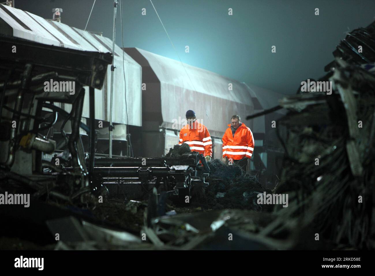GER, Hordorf, Oschersleben - Jan. 30, 2011 Xinhua -- Rescuers work at the scene of a train collision accident in the Germany s eastern state Saxony-Anhalt on Jan. 30, 2011. A passenger and a freight train collided with each other here late Saturday, leaving at least 10 people dead and about 20 seriously injured, police said. Xinhua/Luo Huanhuan zf GERMANY-SAXONY-ANHALT-TRAIN COLLISION PUBLICATIONxNOTxINxCHN Stock Photo