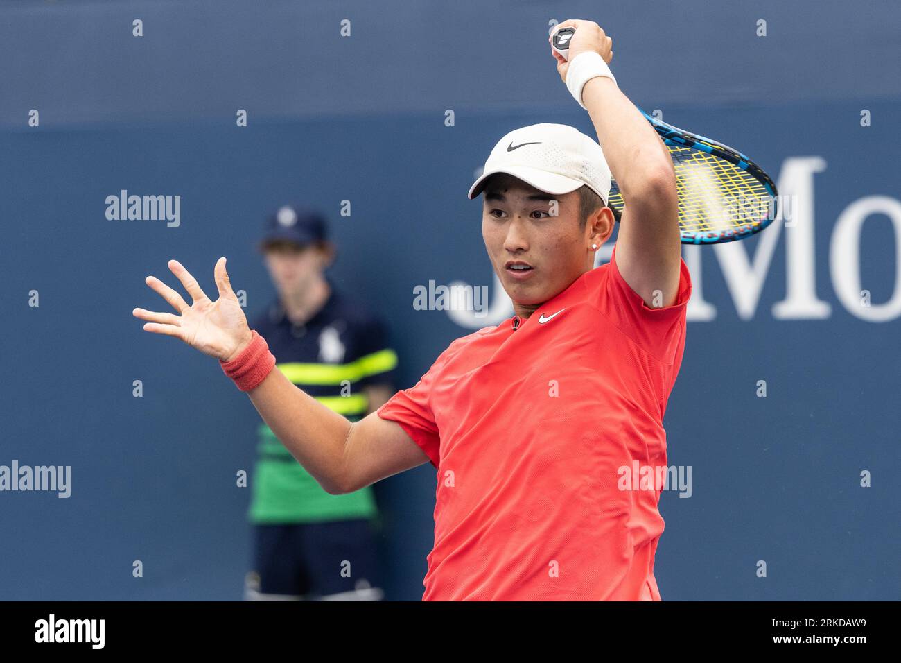 Juncheng Shang of China returns ball during 2nd round match against Patrick Kypson of USA of qualifying for US Open Championships at Billy Jean King Tennis Center in New York on August 24, 2023 Stock Photo