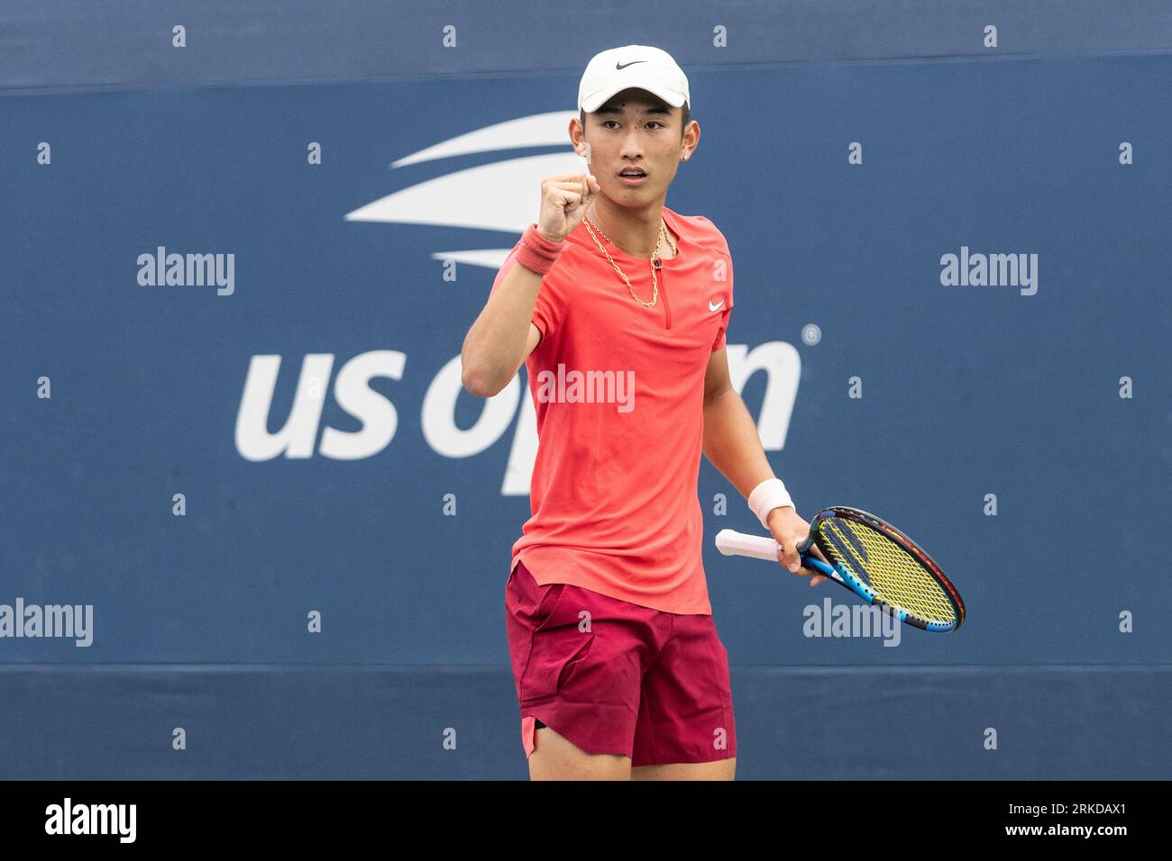 Juncheng Shang of China reacts during 2nd round match against Patrick Kypson of USA of qualifying for US Open Championships at Billy Jean King Tennis Center in New York on August 24, 2023 Stock Photo
