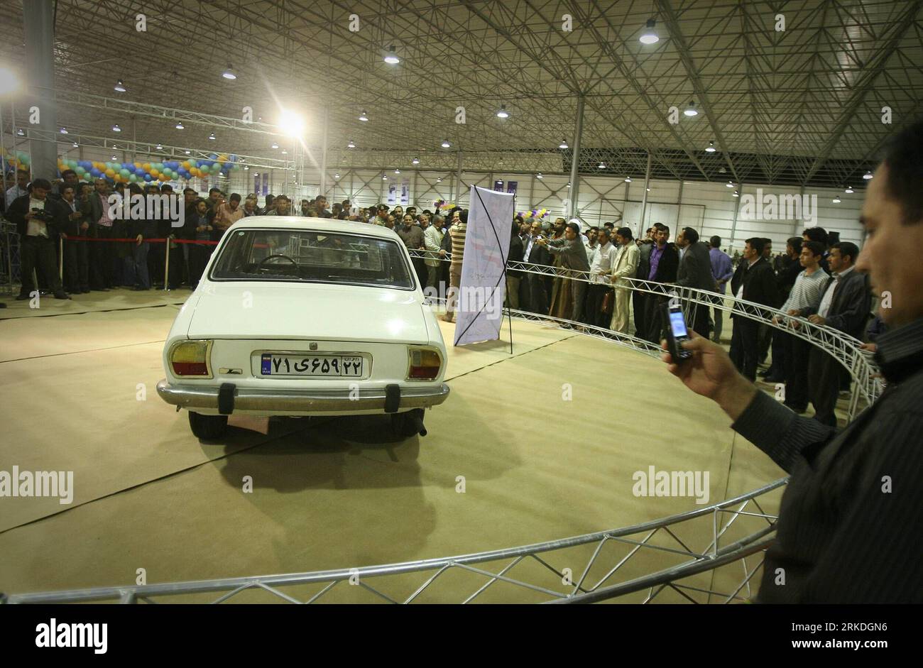 Bildnummer: 54946749  Datum: 23.02.2011  Copyright: imago/Xinhua (110224) -- TEHRAN, Feb. 24, 2011 (Xinhua) -- Iranian president s car is displayed during the First International Car Exhibition in Arvand Free Zone in southwest Iran, Feb. 23, 2011. Iranian President Mahmoud Ahmadinejad s ancient Peugeot 504 is put up to auction for charity during the exhibition, which opened here on Wednesday. At the end of last year, Iranian president said he wanted to sell his car to help a housing project in his country. (Xinhua/Ahmad Halabisaz) IRAN-PRESIDENT S CAR-EXHIBITION PUBLICATIONxNOTxINxCHN Objekte Stock Photo