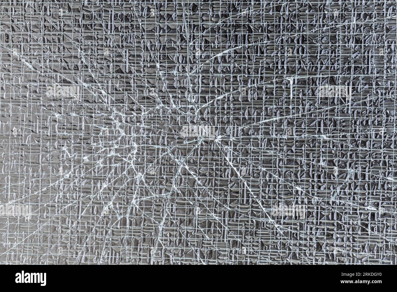 Broken laminated safety glass background and texture Stock Photo