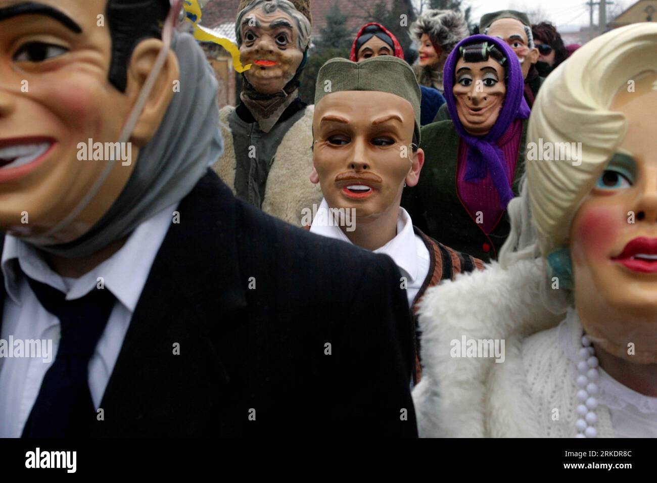 Bildnummer: 54988371  Datum: 06.03.2011  Copyright: imago/Xinhua (110306) -- GLAVICA, March 6, 2011 (Xinhua) -- A Newlyweds in masks from village Glavica go to church in nearby town Paracin, during a marriage parade, 200 km. southeast of Belgrade, Serbia, March 6, 2011. This is a part of Serbian traditional manifestation from the mid 19th century, which is named Komendija , meaning comedy in Serbian rustic language. Across Serbia, gather in villages to celebrate the end of White Week, an old traditional festivity. Various magic acts, ways of dressing, songs and dances of the participants had p Stock Photo