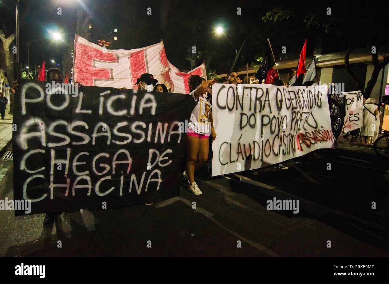Rio De Janeiro, Brazil. 24th Aug, 2023. Protesters hold banners during the demonstration. Activists, black social movements and politicians held a demonstration against the police violence in slums of the Rio de Janeiro. The demonstration was national movement that was rallied in all country. Credit: SOPA Images Limited/Alamy Live News Stock Photo