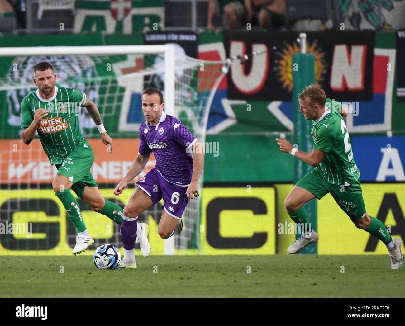 Vienna, Austria. 24th Aug, 2023. Arthur (C) of Fiorentina competes ...