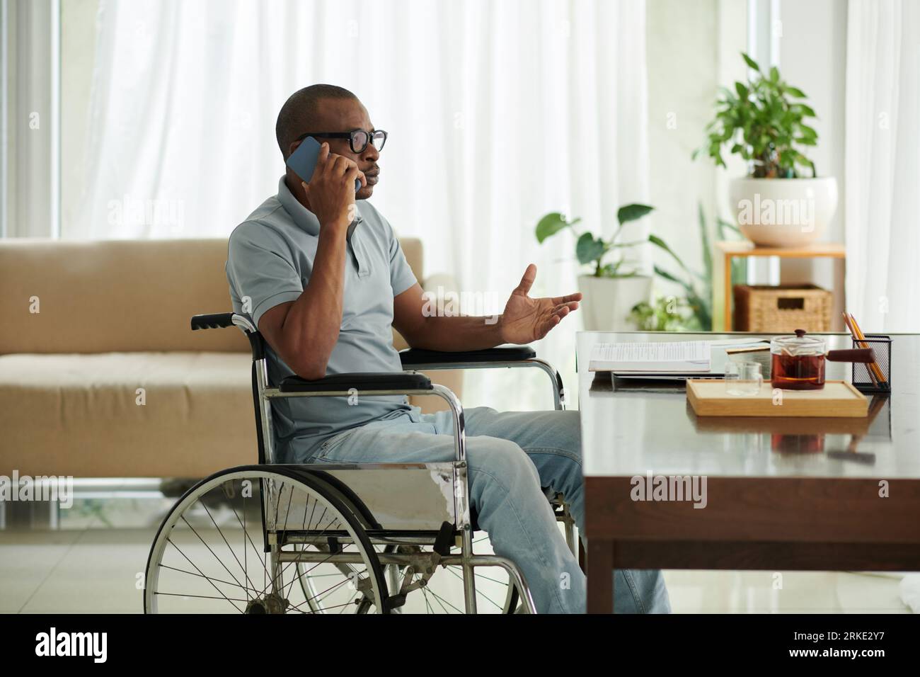 Wheelchair home visit friend hi-res stock photography and images - Alamy