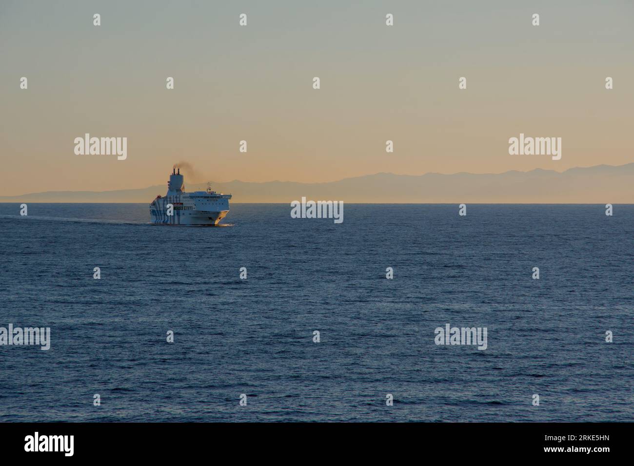 Genova in the evening sun. Mediterranean urban landscape and industry. Stock Photo