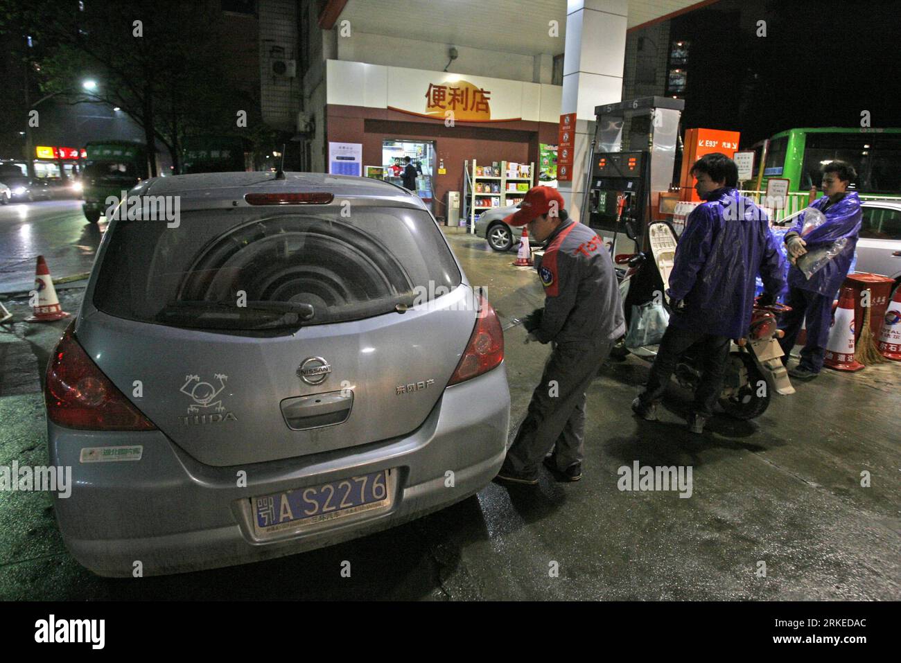 Petrol pump attendant hi-res stock photography and images - Alamy