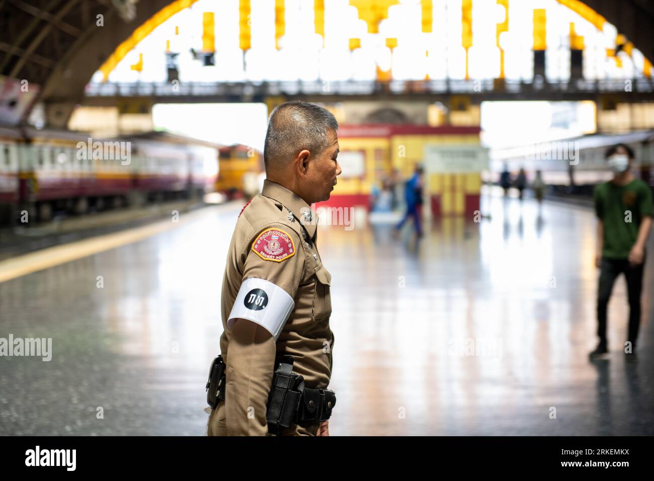 Bangkok, Thailand - March 6th 2020: A dedicated security guard stationed at Bangkok Railway Station. Stock Photo