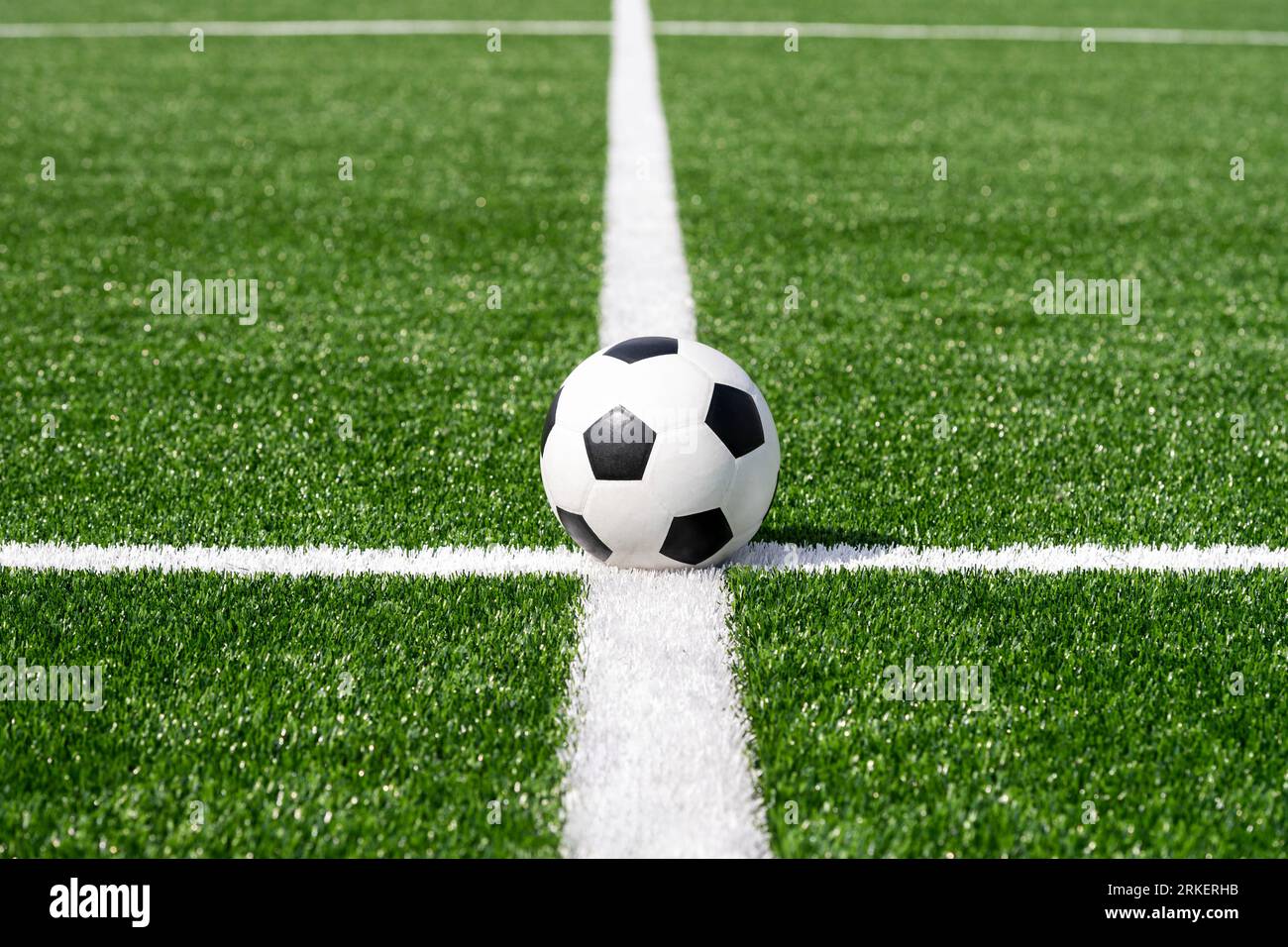 Black and white soccer and football ball in the field. Horizontal sport theme poster, greeting cards, headers, website and app Stock Photo