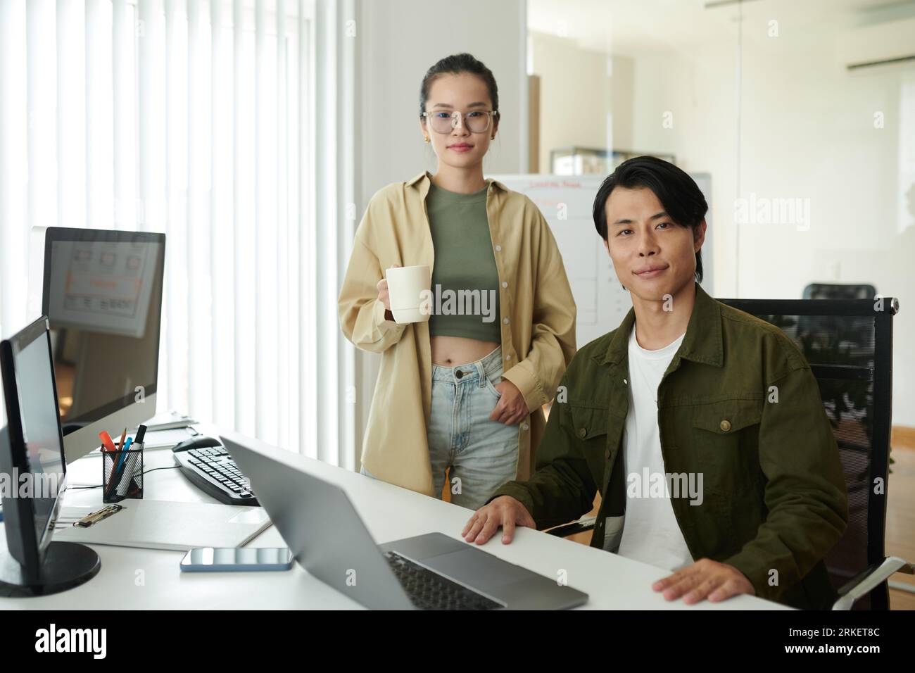 Team of young software developers working in office Stock Photo