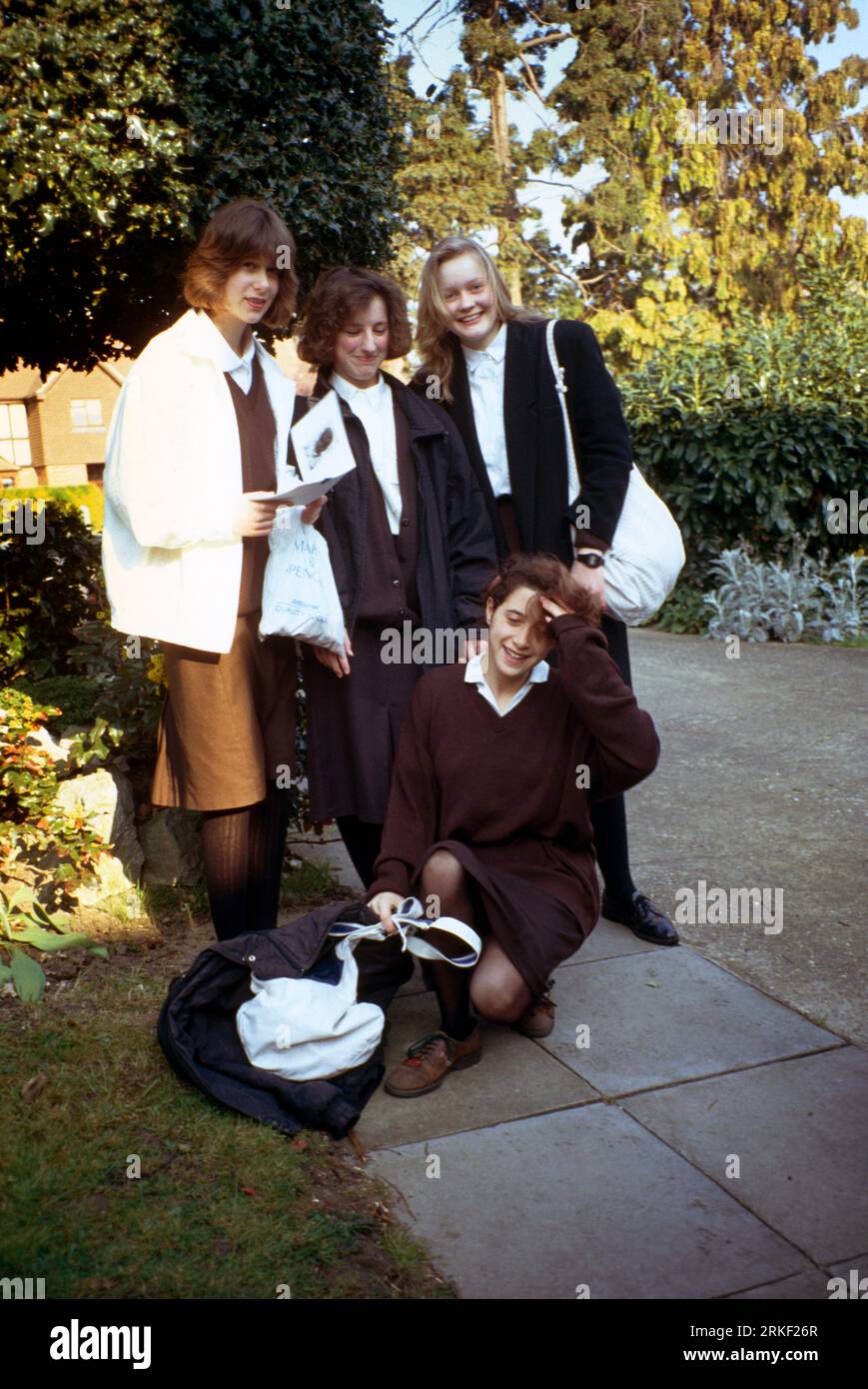 Portrait of Teenage Girls in School Uniform on their Way To School Surrey England Stock Photo