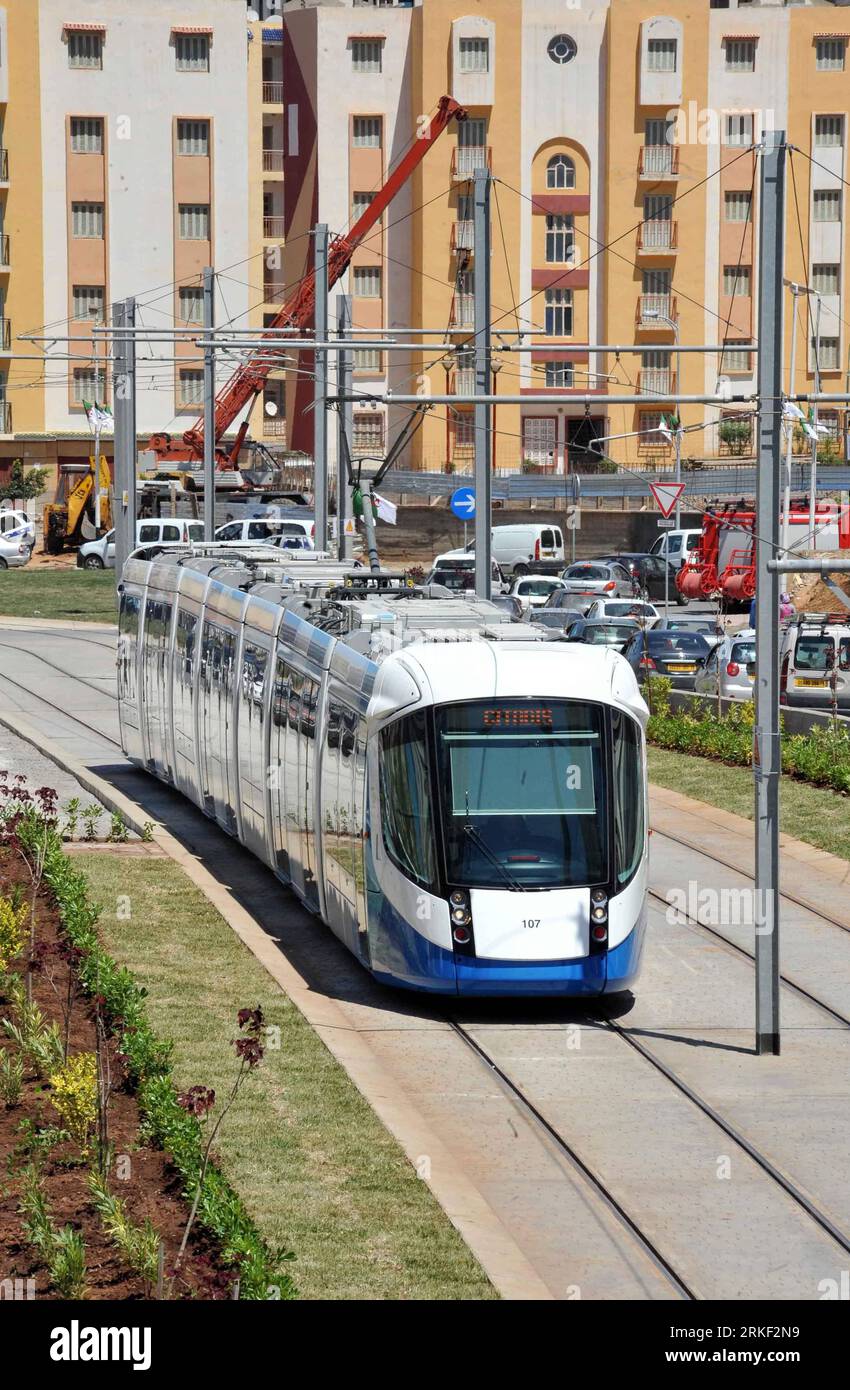 Bildnummer: 55330139  Datum: 08.05.2011  Copyright: imago/Xinhua (110508) -- ALGIERS, May 8, 2011 (Xinhua) -- A train runs on the tramway in Algiers, Algeria, on May 8, 2011. The first section of the Algiers tramway linking Bordj El Kiffan to les Bananiers in Mohammedia, was brought into service on Sunday. Consisting of 13 stations, the 7.2 km long double track section has 12 trains, large enough to carry between 10,000 and 15,000 per day. (Xinhua/Mohamed Kadri) (wjd) ALGERIA-ALGIERS-TRAMWAY PUBLICATIONxNOTxINxCHN Wirtschaft Schienenfahrzeugbau kbdig xkg 2011 hoch  o0 Straßenbahn, Straße, Verk Stock Photo
