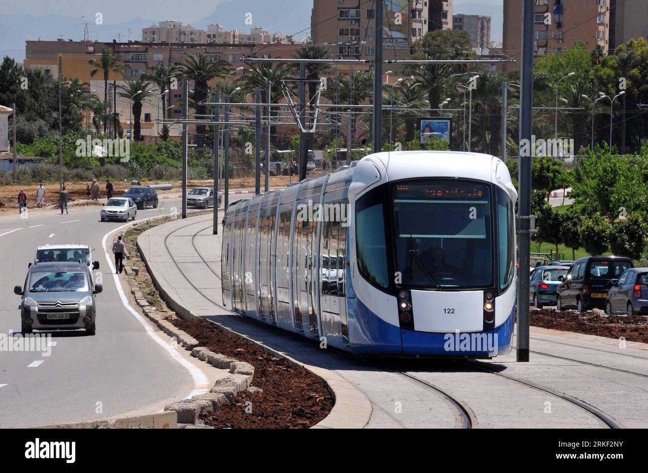 Bildnummer: 55330140  Datum: 08.05.2011  Copyright: imago/Xinhua (110508) -- ALGIERS, May 8, 2011 (Xinhua) -- A train runs on the tramway in Algiers, Algeria, on May 8, 2011. The first section of the Algiers tramway linking Bordj El Kiffan to les Bananiers in Mohammedia, was brought into service on Sunday. Consisting of 13 stations, the 7.2 km long double track section has 12 trains, large enough to carry between 10,000 and 15,000 per day. (Xinhua/Mohamed Kadri) (wjd) ALGERIA-ALGIERS-TRAMWAY PUBLICATIONxNOTxINxCHN Wirtschaft Schienenfahrzeugbau kbdig xkg 2011 quer o0 Straßenbahn, Straße, Verke Stock Photo