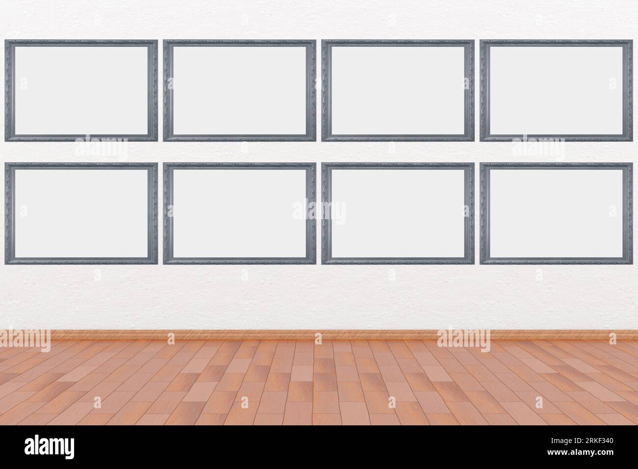 Frames, empty paintings on display on white wall. Eight frames with