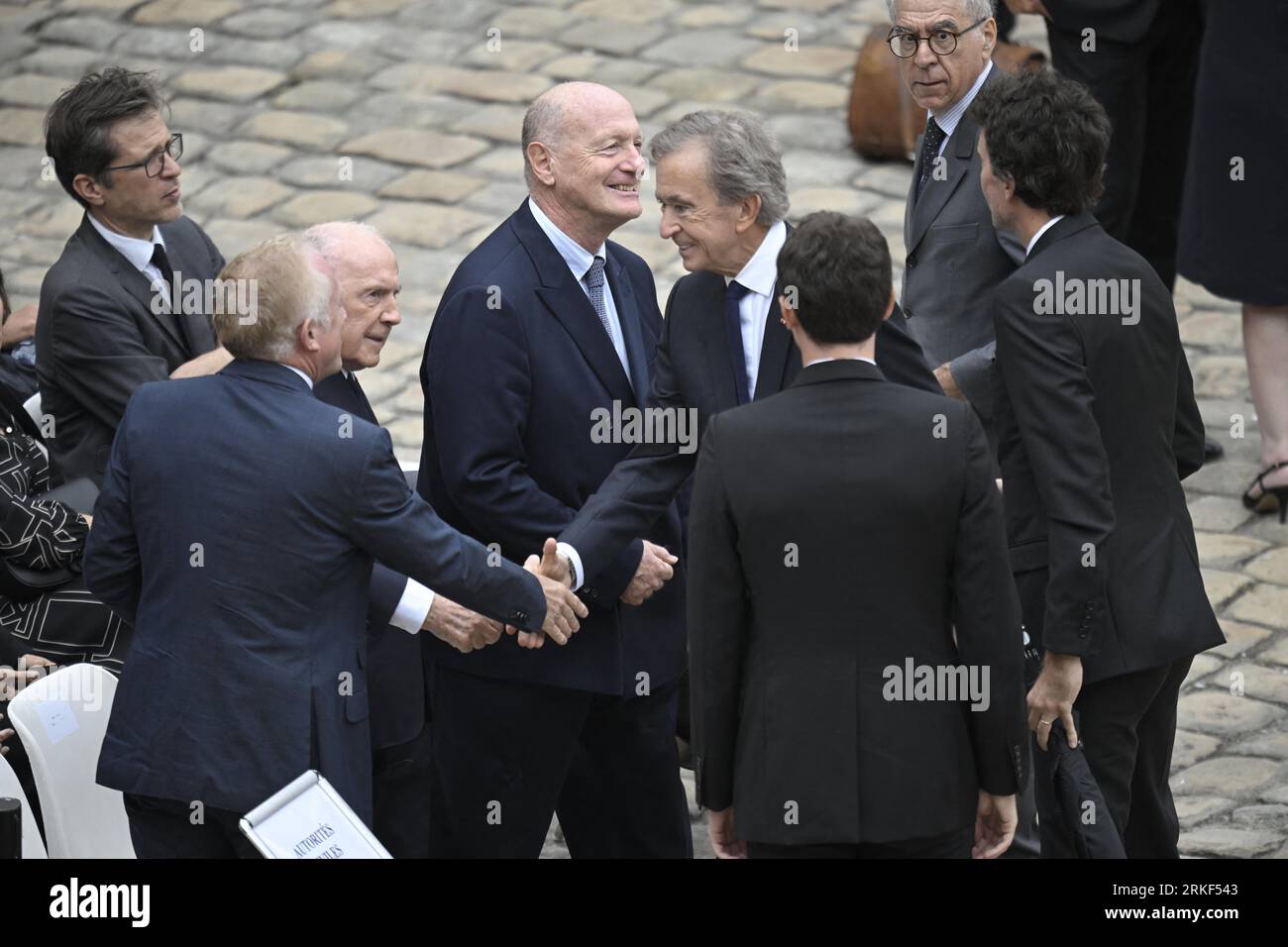 French businessman, chairman and CEO of Kering, Francois-Henri Pinault,  World's top luxury group LVMH head Bernard Arnault and CEO of LVMH Holding  Company, Antoine Arnault during Jean-Louis Georgelin's national tribute  held at