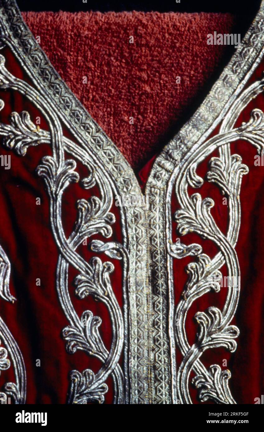Afghanistan Clothing Gold Embroidery Detail on Red Fabric Stock Photo