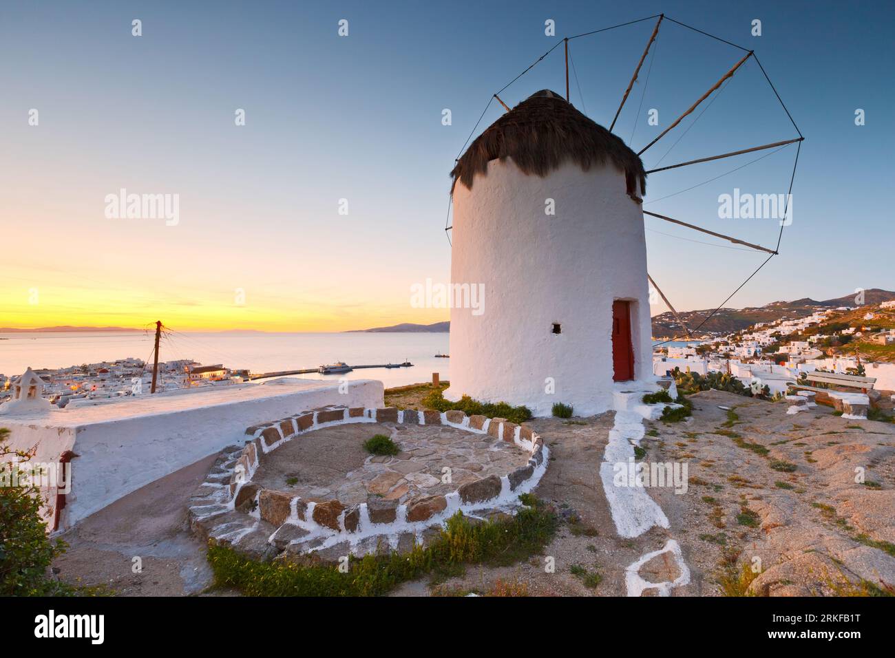 Traditional windmill over the town of Mykonos, Greece. Stock Photo