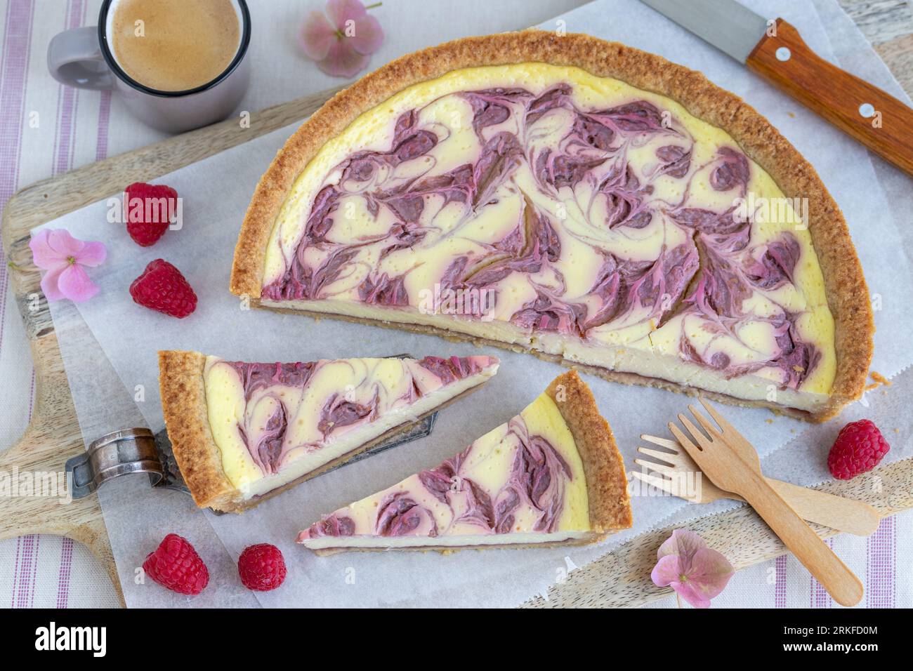 raspberry cheese tart on the wooden board Stock Photo - Alamy