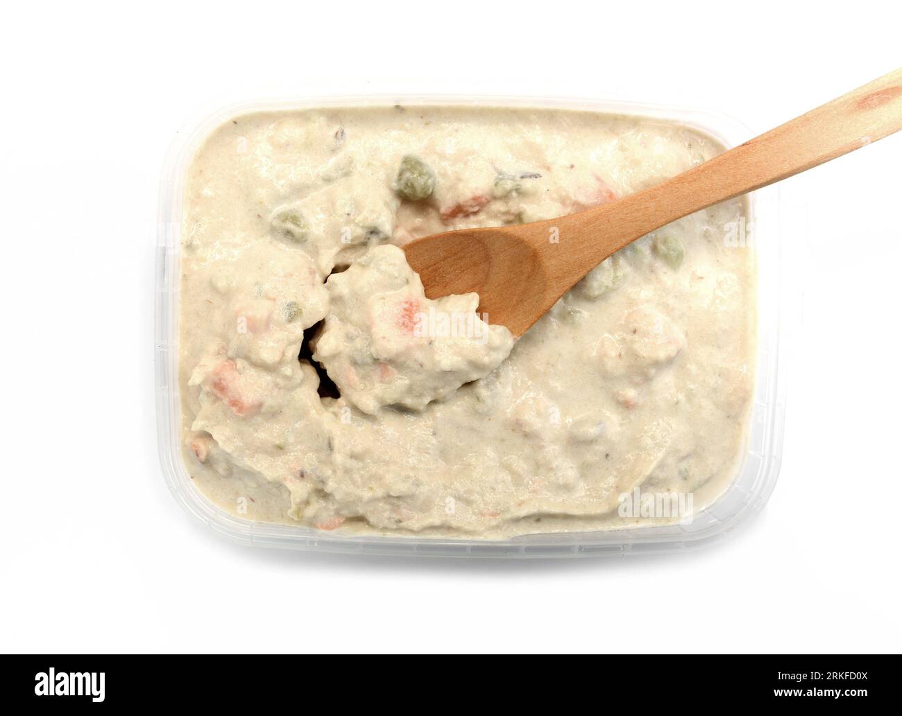 Tuna mayonnaise with tuna flake garnish isolated on white. Tuna spread