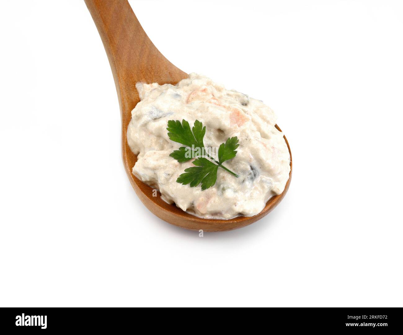 Tuna mayonnaise with tuna flake garnish isolated on white. Tuna spread