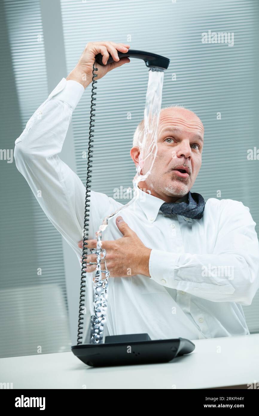 Absurd scene of a senior businessman in white shirt and tie humorously