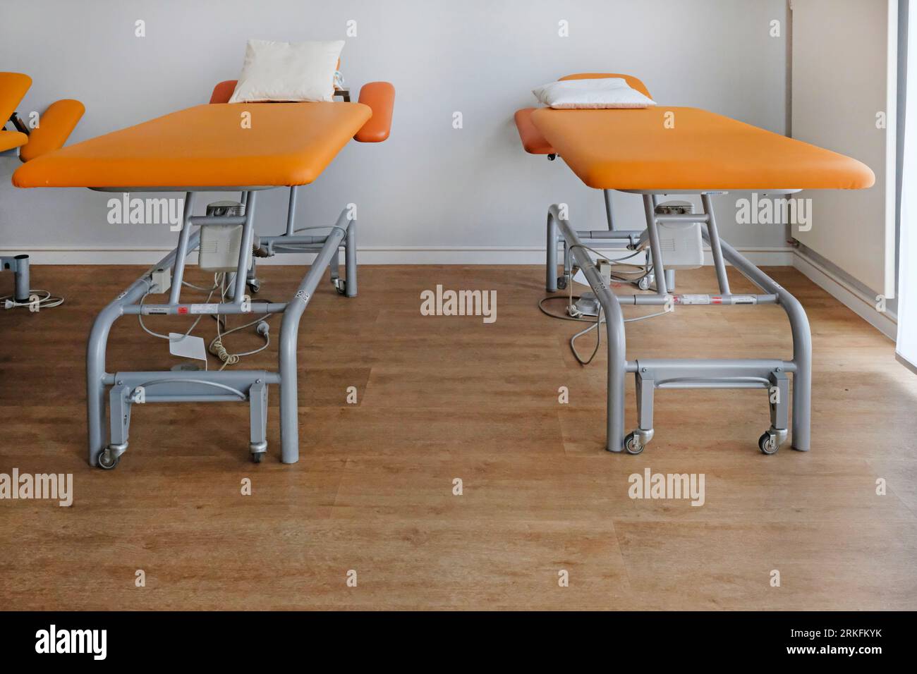 Two examining benches in a doctor's office Stock Photo - Alamy