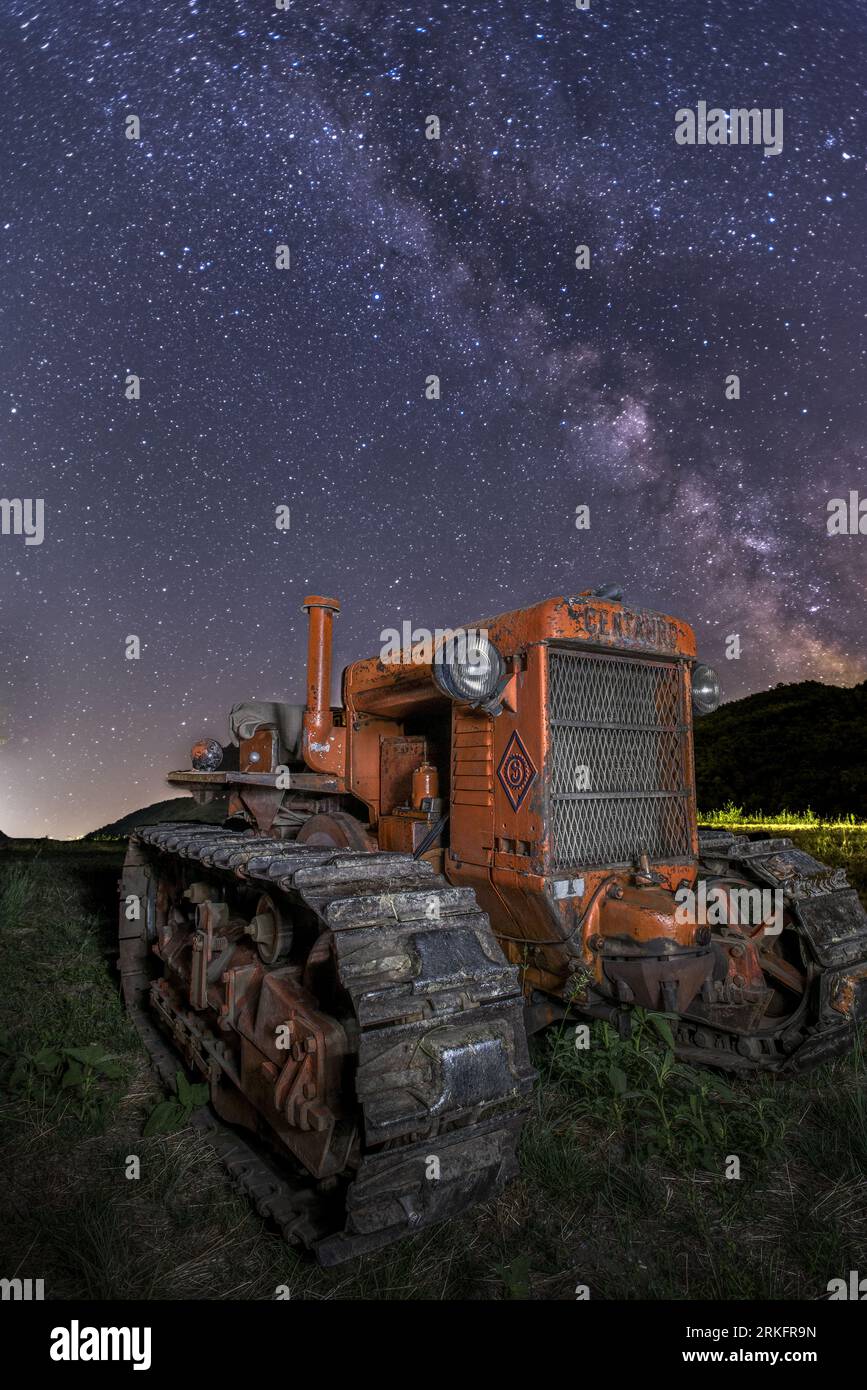 Parma, 10-04-2023. Ancient and very rare Bubba Centauro tractor, photographed under a starry sky with the Milky Way clearly visible. Stock Photo