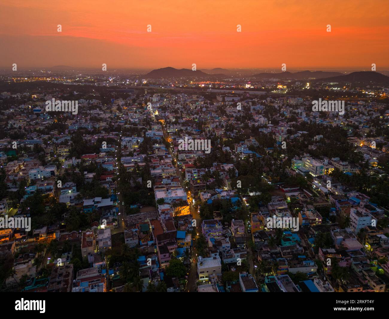 Aerial view of an urban city skyline during a stunning sunset Stock ...