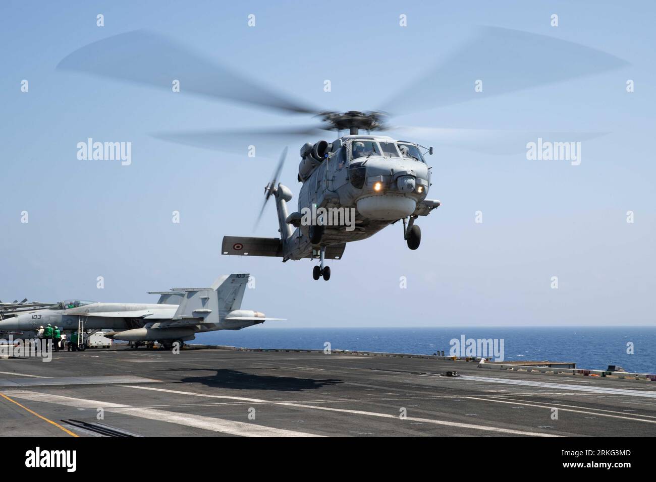 A Turkish Navy S-70 prepares to land on the flight deck USS Gerald R. Ford on Aug. 21, 2023. Photo by Jennifer Newsome Stock Photo