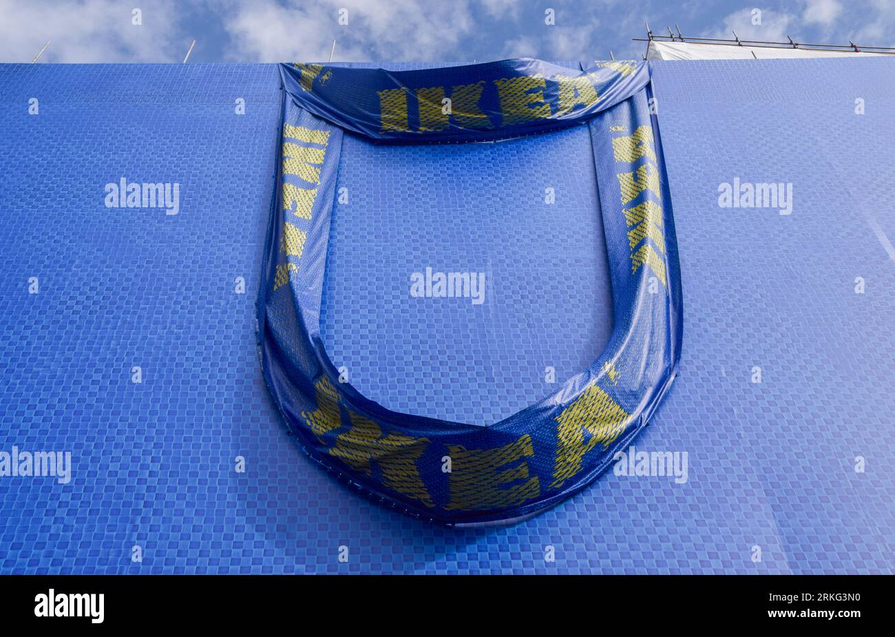 London, UK. 25th August 2023. A giant Ikea shopping bag covers the