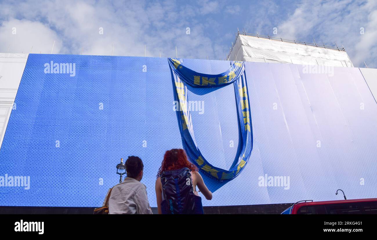 London, UK. 25th August 2023. A giant Ikea shopping bag covers the