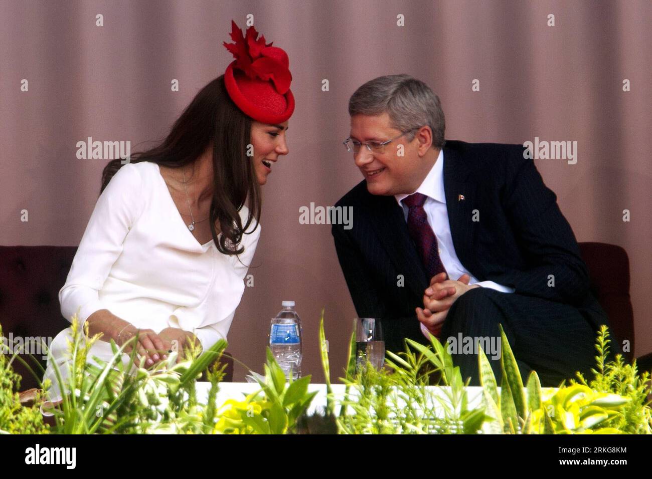 Bildnummer: 55565301  Datum: 01.07.2011  Copyright: imago/Xinhua (110702)-- OTTAWA, July 2, 2011 (Xinhua) -- Canada s Prime Minister Stephen Harper talks to Britain s Duchess of Cambridge Kate during the 144th Canada Day celebrations on Parliament Hill in Ottawa, Canada, on July 1, 2011. The Royal couple is on a nine-day official visit to Canada, their first overseas trip since being married.(Xinhua/Christopher Pike)(zl) CANADA-CANADA DAY-CELEBRATION PUBLICATIONxNOTxINxCHN People Entertainment Adel GBR Königshaus Kate xda x0x premiumd Middleton 2011 quer Catherine    Bildnummer 55565301 Date 0 Stock Photo