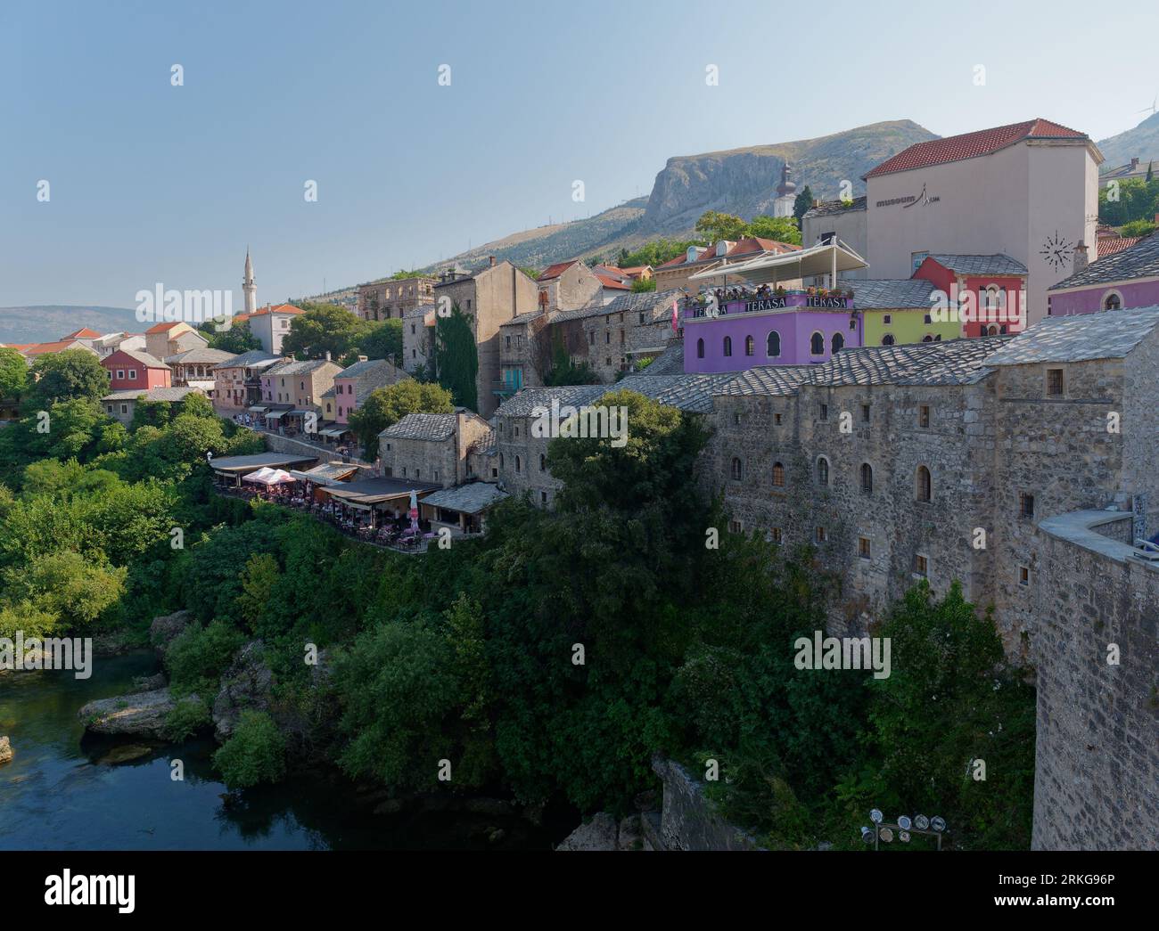 Mostar Old Town with colourful restaurants overlooking the River Neretva on a summers day, Bosnia and Herzegovina, August 23, 2023. Stock Photo