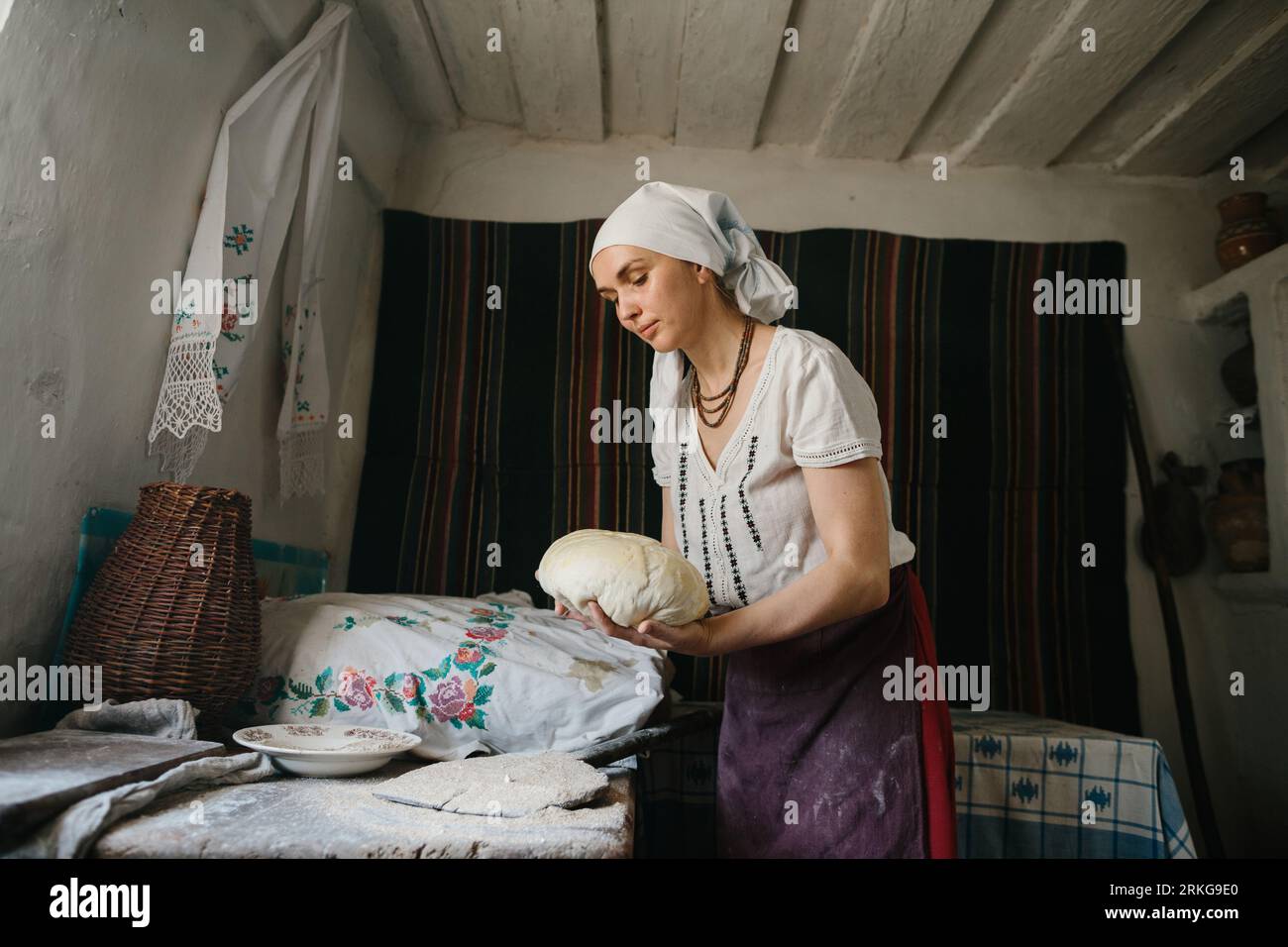 The process of baking homemade bread in woodfired ovens Stock Photo