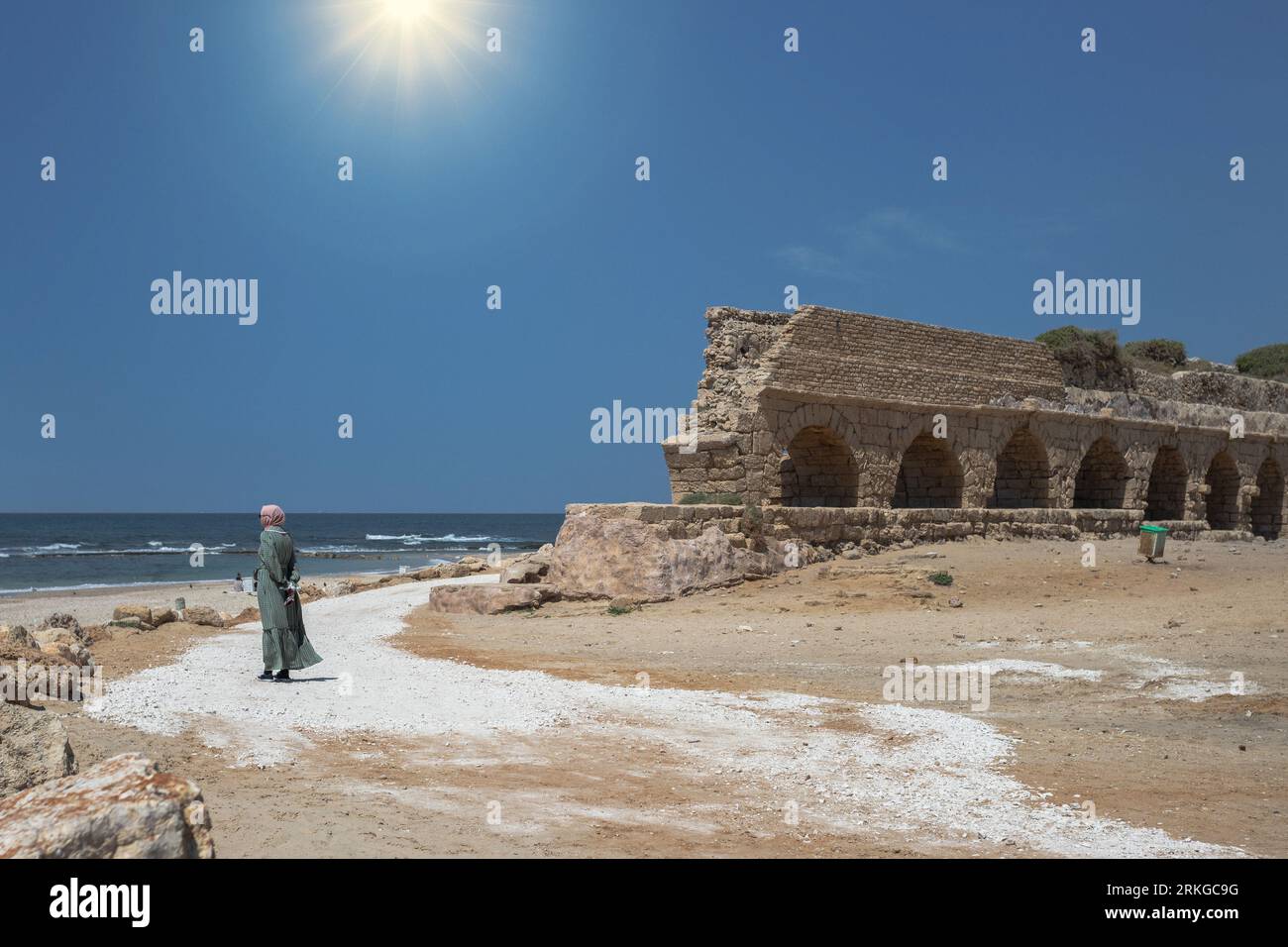 The Hadrianic Aqueduct Of Caesarea Maritima, With A Clear Blue Sky ...