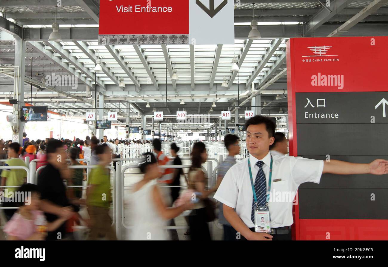 Bildnummer: 55587532  Datum: 12.07.2011  Copyright: imago/Xinhua (110712) -- SHANGHAI, July 12, 2011 (Xinhua) -- A staff member showed the way for visitors at the China Pavilion of Shanghai World Expo in east China s Shanghai, July 12, 2011. The China Pavilion will reopen for three months, from July 12th to October 9th. The price for entry to it has been set at 20 yuan (about 3 USD) and who can enjoy discount can also buy a preferential ticket at 15 yuan (about 2.5 USD). (Xinhua/Ren Long) (hy) CHINA-SHANGHAI EXPO-CHINA PAVILION-REOPEN (CN) PUBLICATIONxNOTxINxCHN Gesellschaft Ausstellung xst x0 Stock Photo