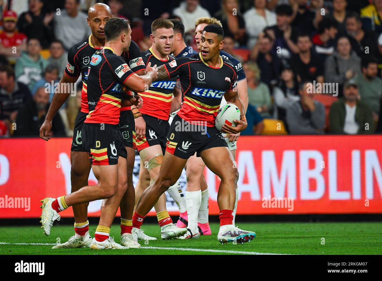 Jamayne Isaako of the Dolphins celebrates a try during the NRL Round 12  match between the Redcliffe Dolphins and the Melbourne Storm at Suncorp  Stadium in Brisbane, Saturday, May 20, 2023. (AAP