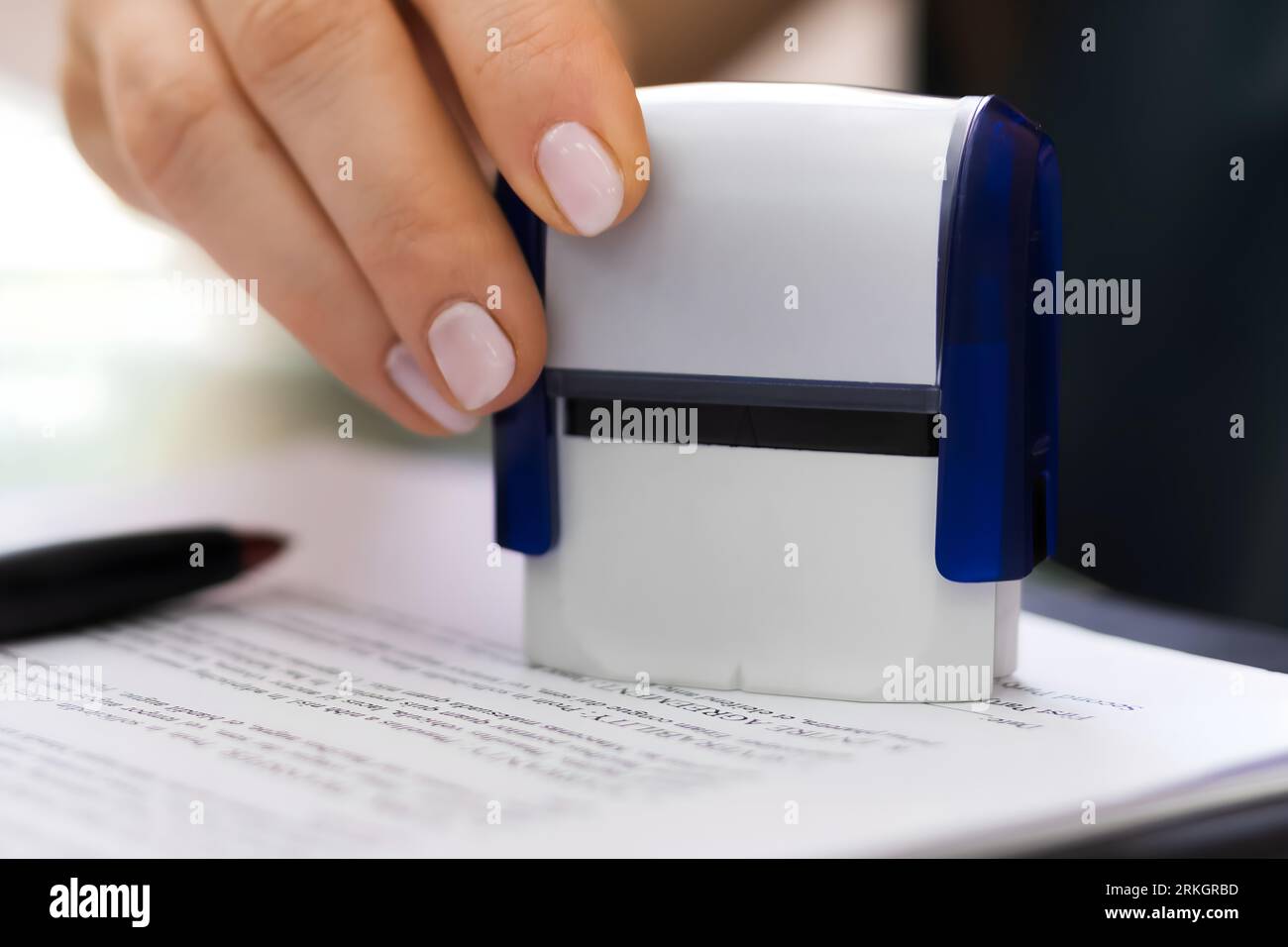 Record Or Permit Document Paper Stamper In Office Stock Photo - Alamy