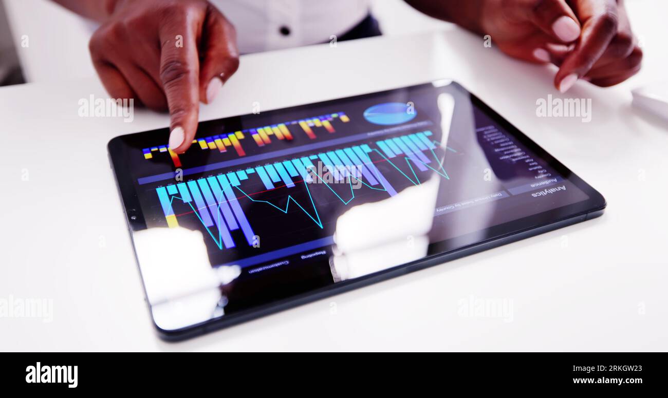 Predictive Business Analytics. African American Analyst Using Computer Stock Photo