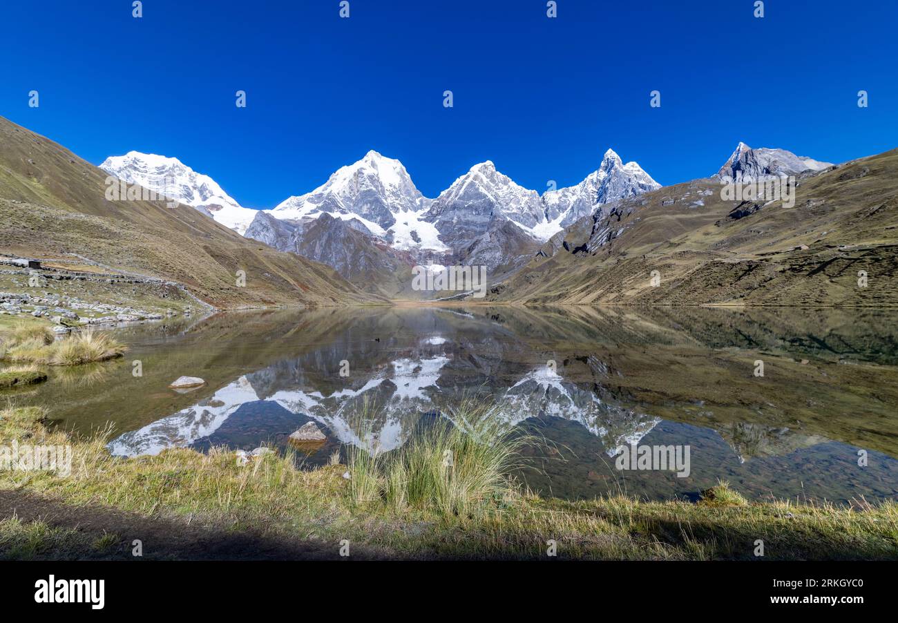 lake Carhuacocha, showing Mt Yerupaja Chico and Mt Jirishanca Grande, Cordillera Huayhuash trekking circuit Stock Photo
