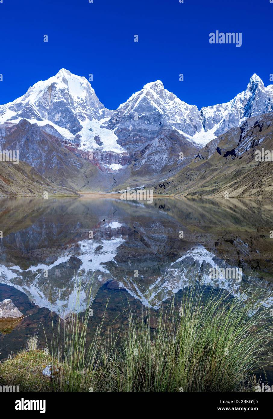 lake Carhuacocha, showing Mt Yerupaja Chico and Mt Jirishanca Grande, Cordillera Huayhuash trekking circuit Stock Photo